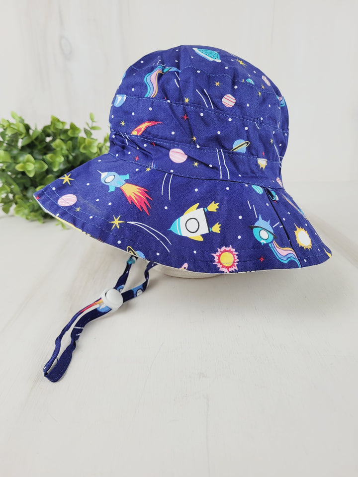 MINI ANGEL REVERSIBLE SUNHATS - SPACE/DINO DESIGN 3-4Y PRE-LOVED