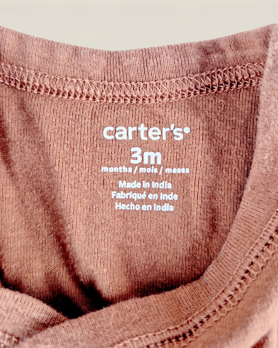 Pre-Loved Carter's Orange Long Sleeve Onesie 3M | Betty’s Marketplace
