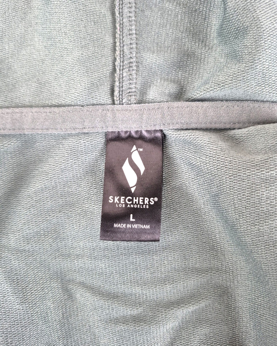 Pre-Loved Sketchers Long Green Hooded Sweater Ladies Large | Betty’s Marketplace