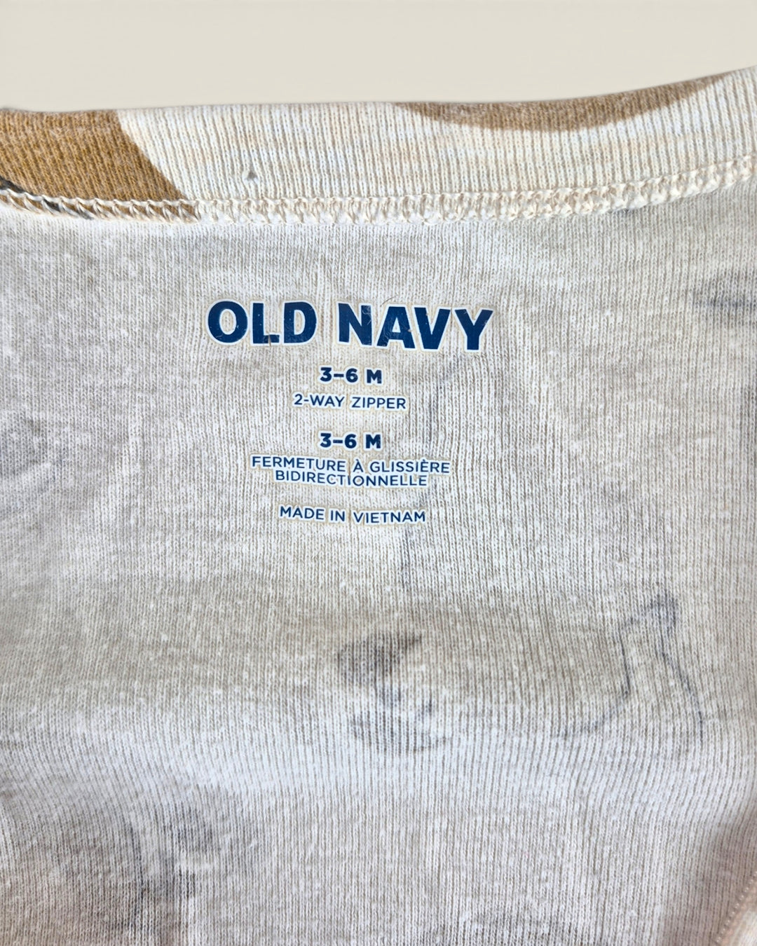 Pre-Loved Old Navy Sloth Footies 3-6M | Betty’s Marketplace
